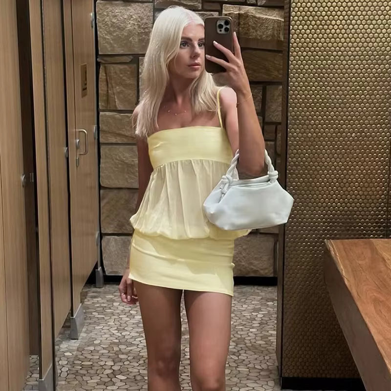 Minivestido ajustado de malla Celeste con hombros descubiertos