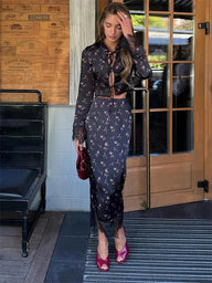 Conjunto Lisa de Top com Recortes Vazados e Renda e Saia Maxi Floral