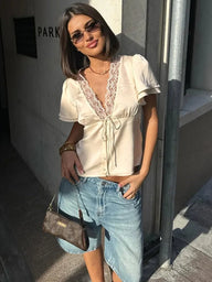 Blusa de encaje satinado Nathalie