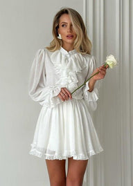 Vestido mini Brigitte con volantes