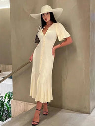 Bianca vestido midi plisado de punto con mangas acampanadas